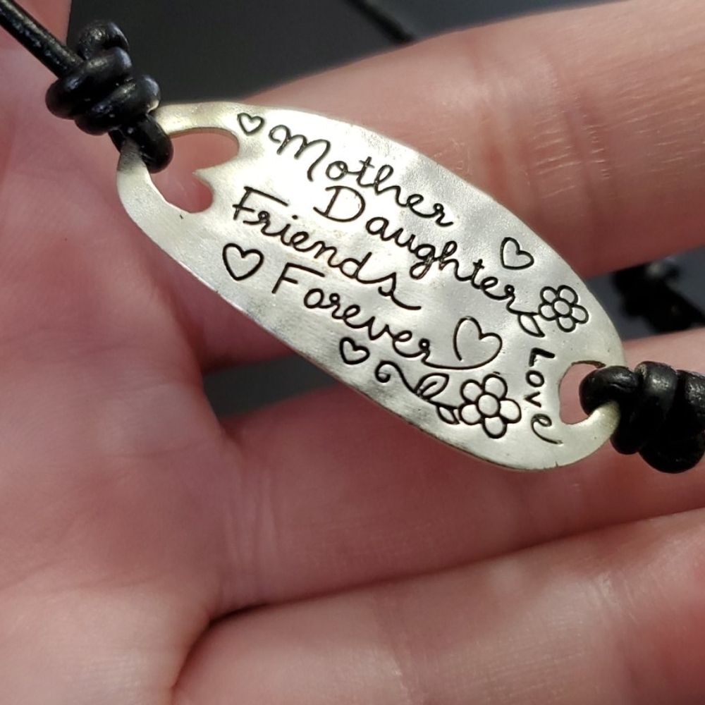 LA TH silver tone bracelet